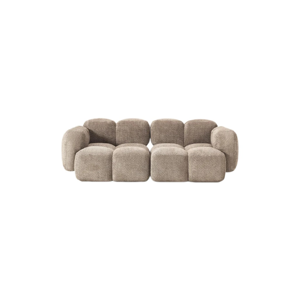 Modularer Stoffsofa in Sandfarben mit runden Formen und komfortablem Design