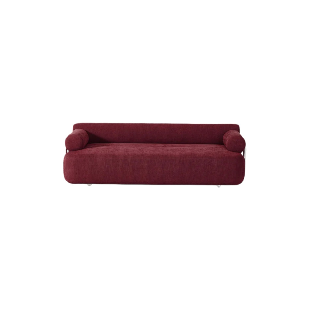 Moderne rote Couch mit runden Armlehnen und minimalistischer Formgebung